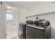 Convenient laundry area with updated washer and dryer units at 15691 E Atlantic Cir, Aurora, CO 80013