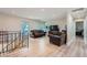 Bright living room boasting modern flooring, neutral walls, and an open, airy layout at 15691 E Atlantic Cir, Aurora, CO 80013