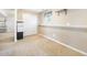 Open living room featuring carpet, and slider closet at 15691 E Atlantic Cir, Aurora, CO 80013
