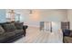 A open living room with light flooring and lots of natural light at 15691 E Atlantic Cir, Aurora, CO 80013