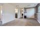 Spacious room featuring neutral carpet, ample natural light, and a calming color scheme at 15691 E Atlantic Cir, Aurora, CO 80013
