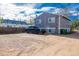 View of the rear of the home, and a black truck is parked in the yard at 4087 S Clarkson S St, Englewood, CO 80113