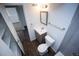 Updated bathroom featuring a vanity, toilet, and tiled shower/tub combination at 4087 S Clarkson S St, Englewood, CO 80113