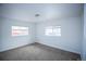 Cozy bedroom with neutral carpet and natural light streaming through the window at 4087 S Clarkson S St, Englewood, CO 80113