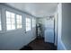 Laundry area with washer and dryer hookups and multiple windows for natural light at 4087 S Clarkson S St, Englewood, CO 80113