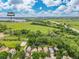 Aerial view of 76 Mineola Ct with nearby Baseline Reservoir, surrounded by lush greenery and open space at 76 Mineola Ct, Boulder, CO 80303
