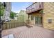 A spacious back deck with a second story balcony offers outdoor entertaining with sunny views at 76 Mineola Ct, Boulder, CO 80303