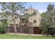 Back exterior of the home featuring private wooden fence, and large wooden deck at 76 Mineola Ct, Boulder, CO 80303