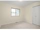 Bedroom featuring neutral color palette, a window and a closet at 76 Mineola Ct, Boulder, CO 80303