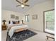 Primary bedroom features vaulted ceiling, private balcony, and modern furnishings at 76 Mineola Ct, Boulder, CO 80303