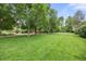 Expansive park with mature trees and picnic tables offers a peaceful setting for outdoor enjoyment at 76 Mineola Ct, Boulder, CO 80303