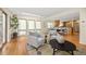 Spacious living room with an open floor plan, hardwood floors, and abundant natural light at 76 Mineola Ct, Boulder, CO 80303