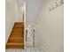 Classic wooden staircase leading to the upper level, providing access to additional rooms at 76 Mineola Ct, Boulder, CO 80303