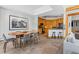 Eat-in dining and kitchen area features wood cabinetry and breakfast bar at 293 Settlers Dr, Breckenridge, CO 80424