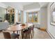 Dining area features large windows, a modern table, and bright light at 293 Settlers Dr, Breckenridge, CO 80424