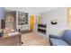 Cozy home office featuring built-in shelves, hardwood floors, and modern decor, creating a stylish and functional workspace at 293 Settlers Dr, Breckenridge, CO 80424