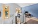 Home office with bright windows, modern desk setup, hardwood floors, and stylish décor, creating a productive workspace at 293 Settlers Dr, Breckenridge, CO 80424