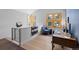 Home office with natural light, a cozy chair, and a functional desk space, designed for comfort and efficiency at 293 Settlers Dr, Breckenridge, CO 80424