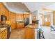 Well-equipped kitchen featuring wooden cabinetry, stainless steel appliances, and a functional center island at 293 Settlers Dr, Breckenridge, CO 80424