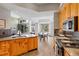 Open kitchen and living space boasts natural light and wood cabinetry at 293 Settlers Dr, Breckenridge, CO 80424