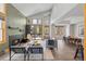 Bright, open-concept living room features a modern fireplace, high ceilings, and floor to ceiling windows at 293 Settlers Dr, Breckenridge, CO 80424