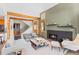 Comfortable living area boasts natural light, stylish furniture, and a cozy fireplace at 293 Settlers Dr, Breckenridge, CO 80424
