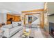 Inviting living space offers wood accents, an open layout, and staircase access at 293 Settlers Dr, Breckenridge, CO 80424