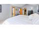 Bright main bedroom featuring vaulted ceiling, ensuite bathroom, and walk-in closet at 293 Settlers Dr, Breckenridge, CO 80424