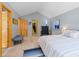 Spacious main bedroom with hardwood floors, ensuite bathroom access, and a walk-in closet, combining luxury and practicality at 293 Settlers Dr, Breckenridge, CO 80424