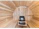 Barrel sauna featuring wood finishings and a heater at 293 Settlers Dr, Breckenridge, CO 80424