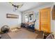 Workout room featuring stationary bike, weights, and a large window with natural light at 293 Settlers Dr, Breckenridge, CO 80424