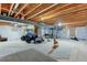 Unfinished basement with exposed wood beams, mechanicals, and lots of open storage space at 1995 E 166Th Ave, Thornton, CO 80602