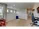Cozy bonus room with plush carpeting, natural light, and a versatile layout perfect for relaxing at 1995 E 166Th Ave, Thornton, CO 80602