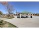 Community park and play area with picnic tables and a shaded picnic shelter at 1995 E 166Th Ave, Thornton, CO 80602
