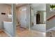 Inviting entryway with hardwood floors, a cozy bench, and an abundance of natural light at 1995 E 166Th Ave, Thornton, CO 80602