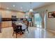 Eat in kitchen with wood floors and modern appliances at 1995 E 166Th Ave, Thornton, CO 80602