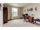 Bright and spacious office with neutral carpeting, a large window, and a functional desk area at 1995 E 166Th Ave, Thornton, CO 80602