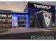 Exterior of Topgolf entertainment venue with a sleek, modern design against a twilight sky at 1995 E 166Th Ave, Thornton, CO 80602