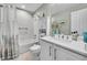 Bright bathroom with vanity, toilet, and tub with shower at 720 Reid Pl, Castle Rock, CO 80108