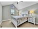 Bright bedroom with a vaulted ceiling, fan, and carpeted floor at 720 Reid Pl, Castle Rock, CO 80108