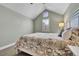 Bright bedroom with a vaulted ceiling, carpeted floors and ceiling fan at 720 Reid Pl, Castle Rock, CO 80108