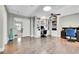 Spacious office featuring custom built-ins, a ceiling fan and light, and hardwood flooring at 720 Reid Pl, Castle Rock, CO 80108