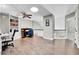 Second view of the office featuring custom built-ins, a ceiling fan and light, and hardwood flooring at 720 Reid Pl, Castle Rock, CO 80108