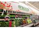 Wide shot of fresh produce section displaying colorful vegetables and greens in a farmers market at 720 Reid Pl, Castle Rock, CO 80108