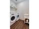 Convenient laundry room with a washer, dryer, and utility sink at 9227 Salida St, Commerce City, CO 80022