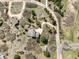 High angle aerial view of a home with a long driveway and a detached garage at 18750 Spring Valley Rd, Monument, CO 80132