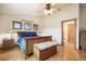 Bedroom featuring a wooden bed, hardwood floors, and natural light at 18750 Spring Valley Rd, Monument, CO 80132