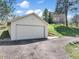 Spacious detached garage with light-colored paint, located on a well-maintained property at 18750 Spring Valley Rd, Monument, CO 80132