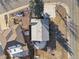 Aerial view of a house showcasing its roof and surrounding yard at 5505 Brentwood St, Arvada, CO 80002