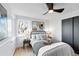 Bright bedroom with a comfortable bed, stylish decor, and plenty of natural light at 5505 Brentwood St, Arvada, CO 80002